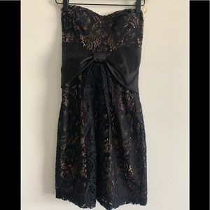 Black Strapless Body-Con Mini Dress.